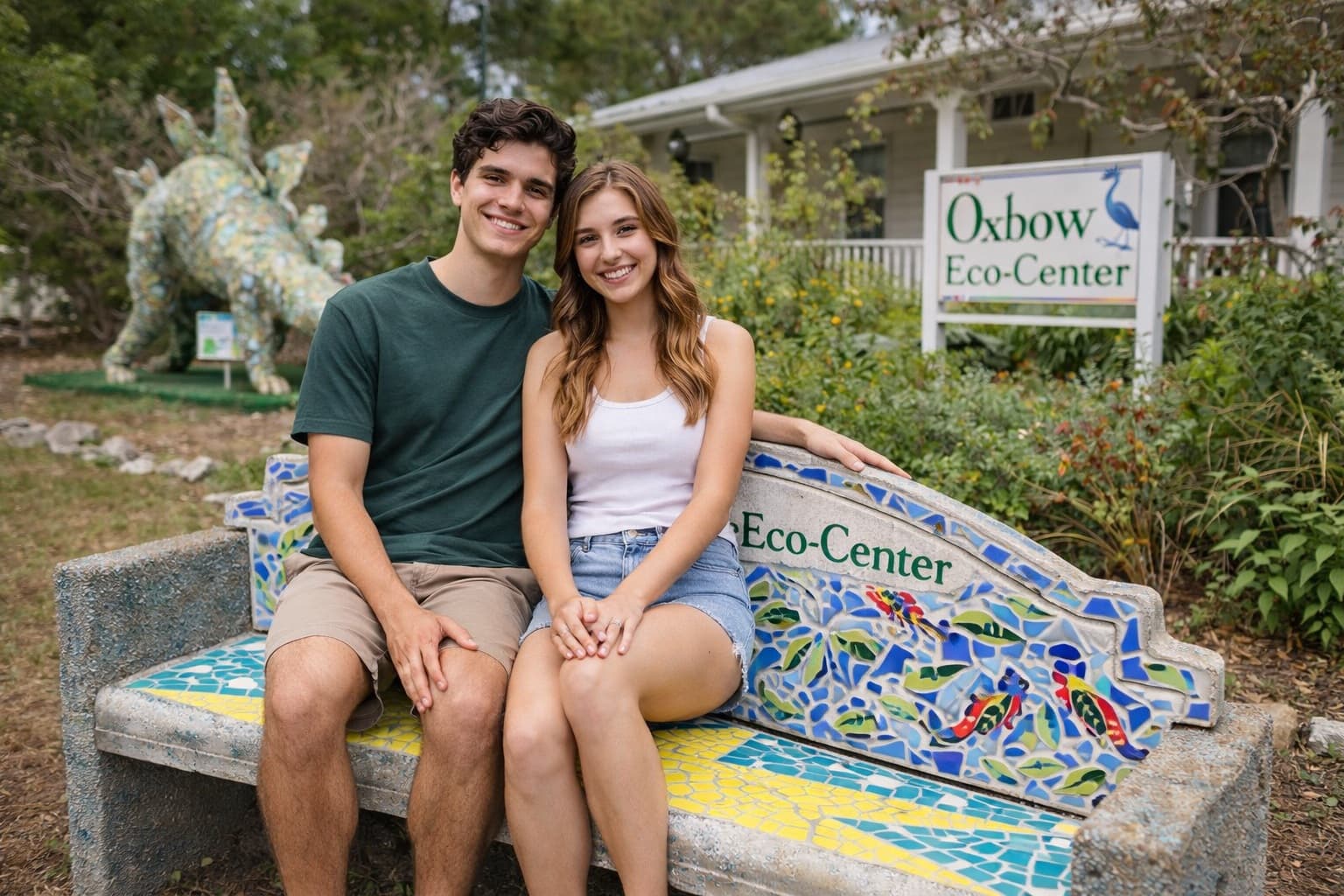 a couple sitting on a bench at Oxbow Eco Center
