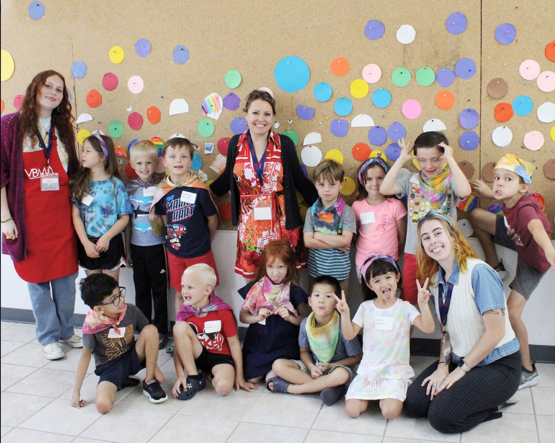 Young art campers and instructors posing in a Vero Beach Museum of Art studio